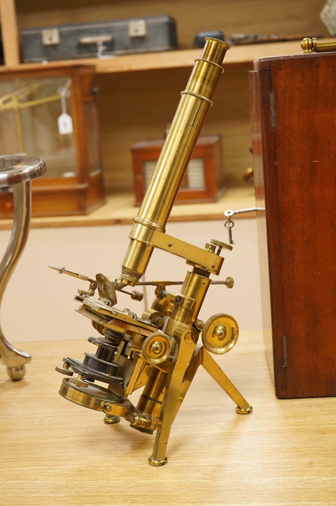 A fine mid 19th century brass compound monocular microscope, by Powell and Lealand, 170, Euston Road, London, dated 1869, mahogany cased, together with a mahogany cased accessory box, containing - 7 objectives, 4 Leiberk